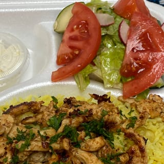 Shawarma Chicken with jollof rice or salad